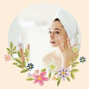 close-up of woman in the mirror putting a cream on her face